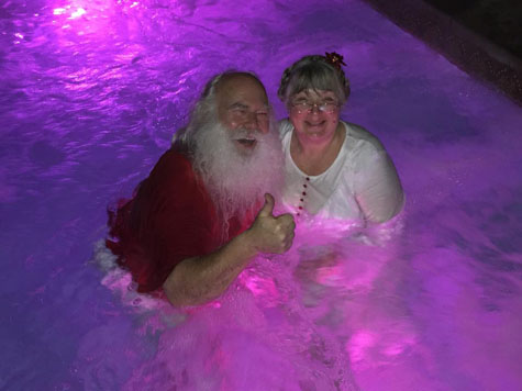 Mrs Claus and Santa in Hot tub